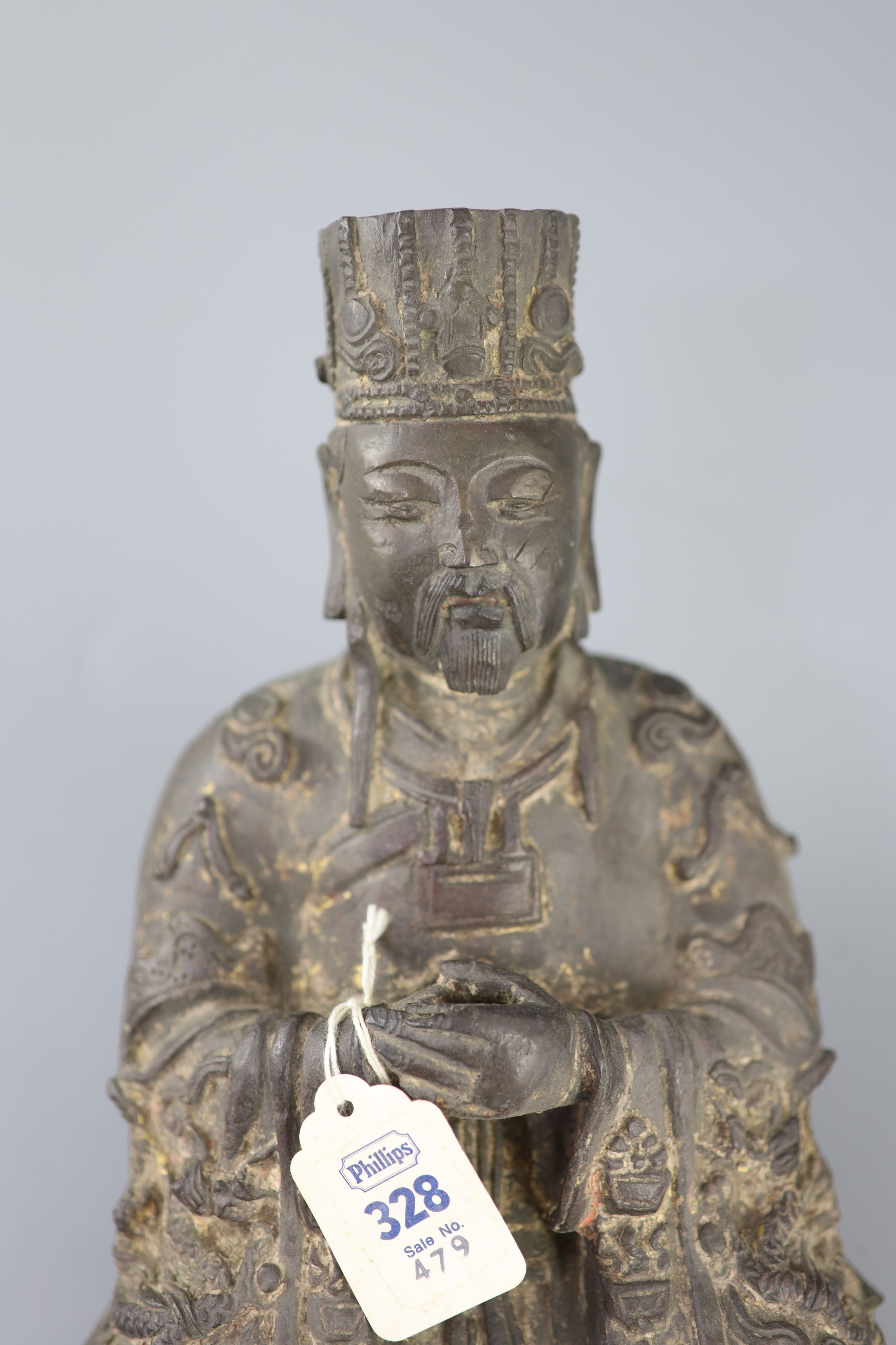 A Chinese Daoist bronze seated figure of Wenchang Wang, late Ming dynasty, 27.5cm high, losses, Provenance - A. T. Arber-Cooke